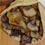 Greek Steak Pitas with Caramelized Onions and Mushrooms Recipe Image