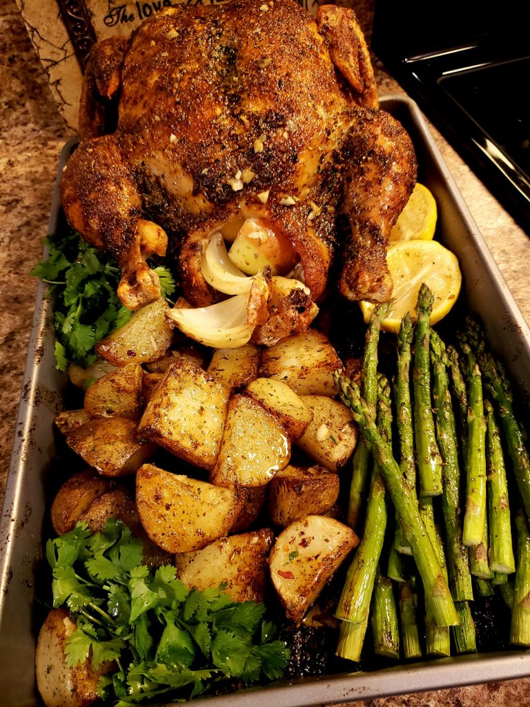 Roasted lemon thyme chicken, garlic butter roasted potatoes and asparagus Recipe Image