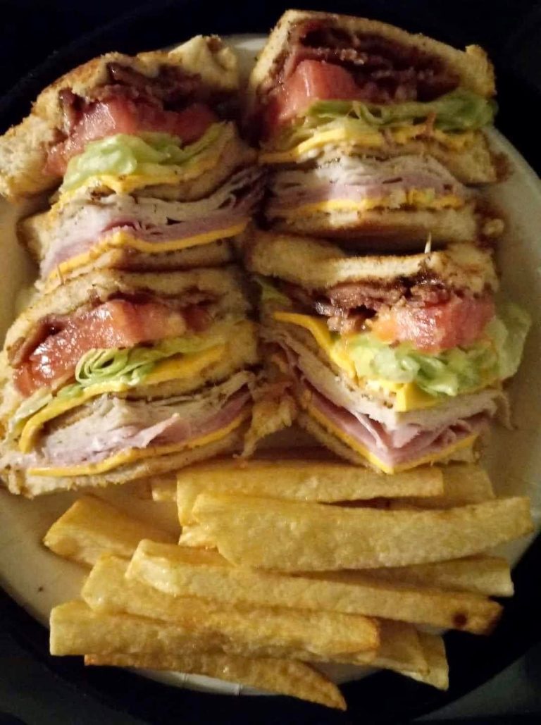 Chicken bacon club sandwich with lettuce tomato and toasted bread