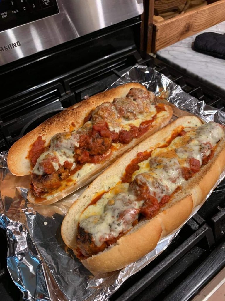 Homemade meatball subs with marinara and melted cheese