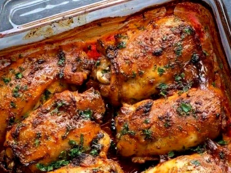 Crispy oven-baked chicken thighs with golden seasoned skin